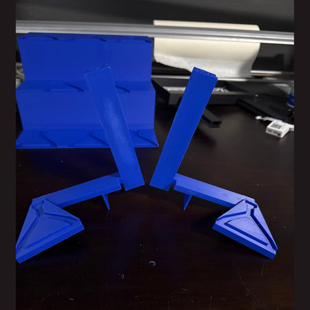 Blue 3D-printed model on a dark surface
