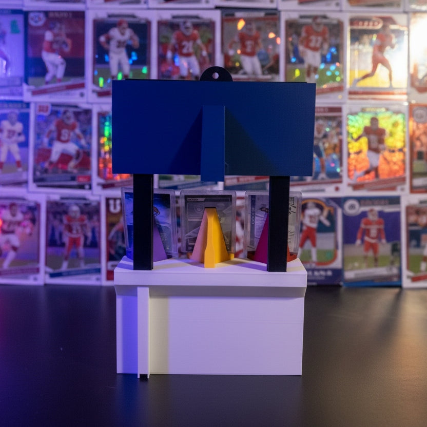 3D printer with a blue and yellow object in the process of printing against a dark background