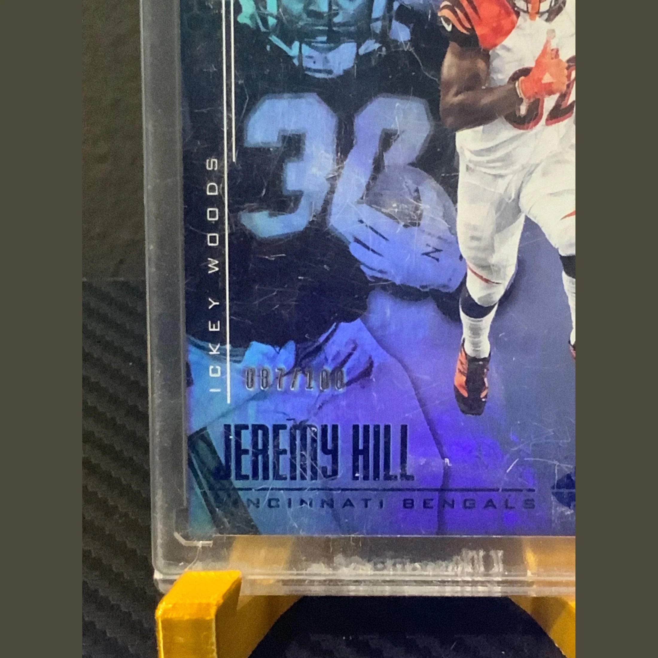 Football trading card of Jeremy Hill with a clear protective sleeve.