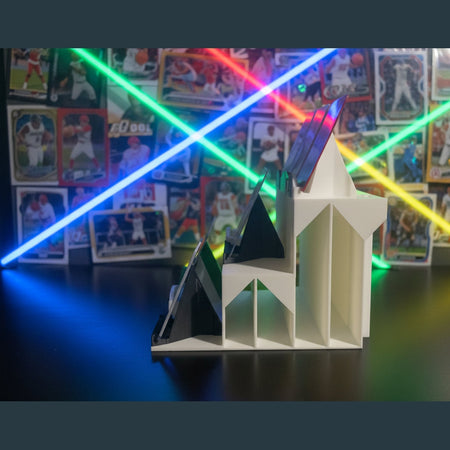 White plastic component on a dark surface