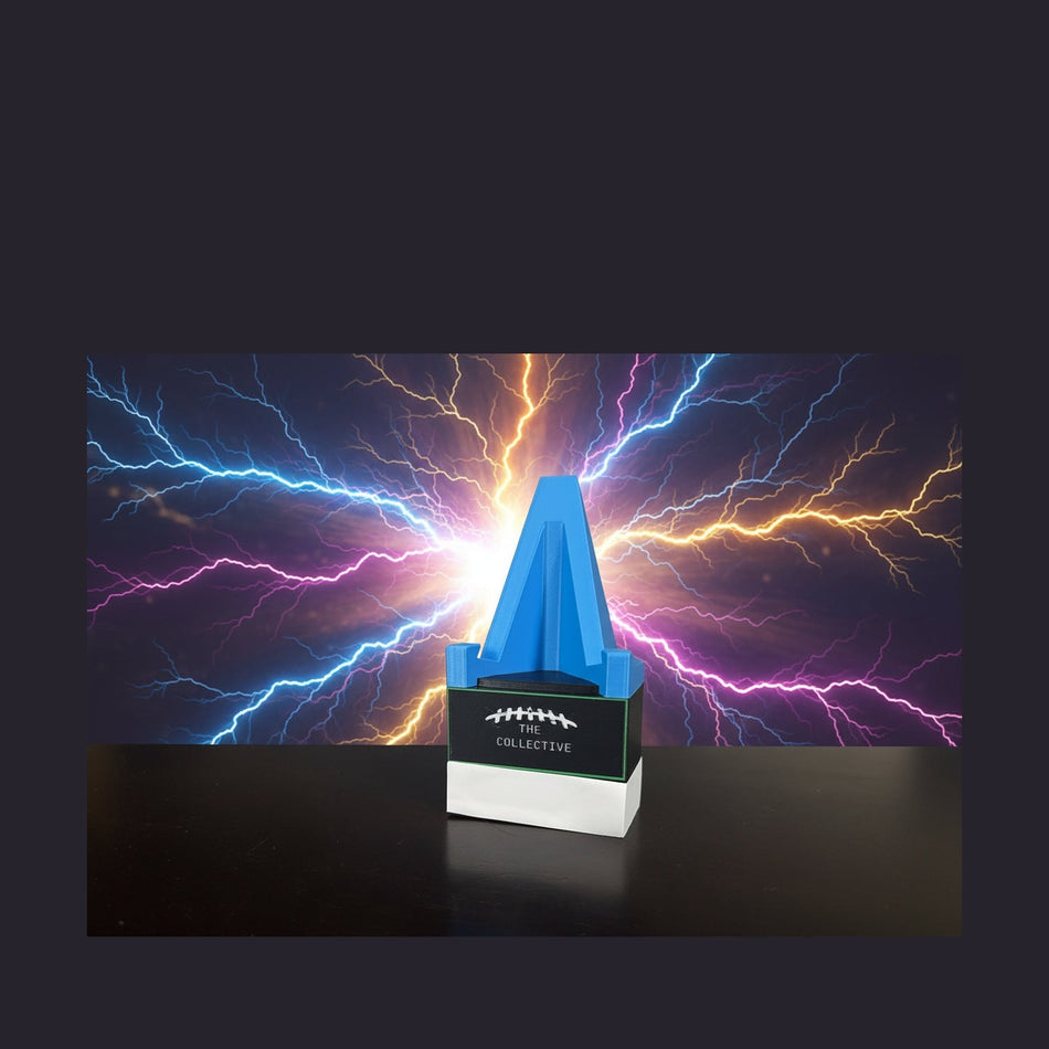 Blue plastic tool with a brand label on a dark surface