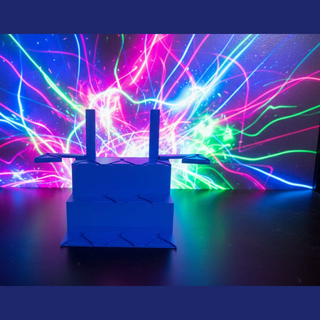 Blue folding stand against a dark wall