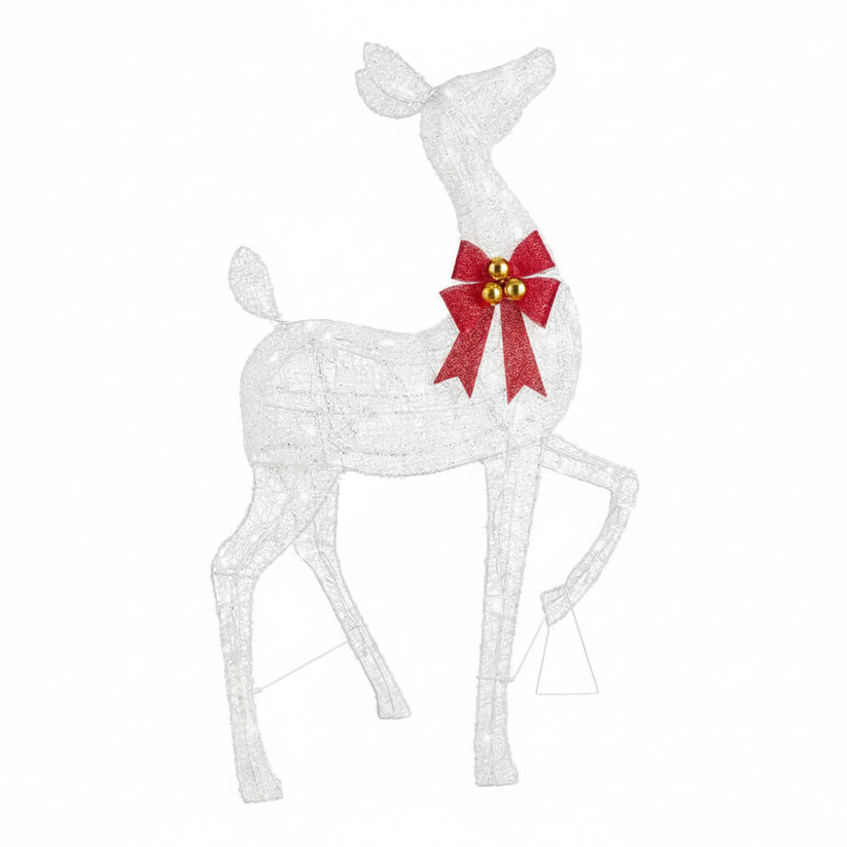 Decorative reindeer figure with a red bow and gold bells on a white background