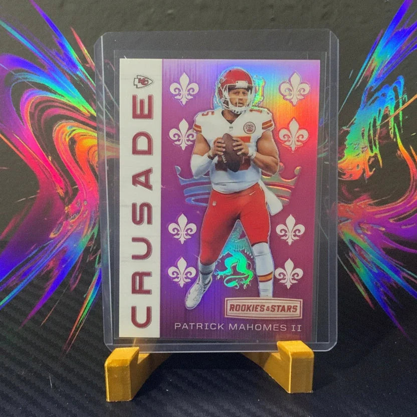 Football trading card of Patrick Mahomes II in a display case with colorful abstract designs on a dark background.