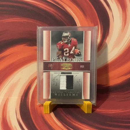 Collectible sports card in protective holder on a textured surface
