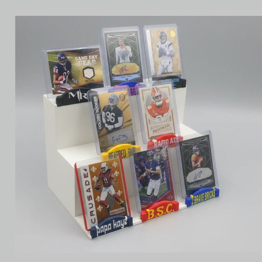 Collection of sports trading cards in a display case
