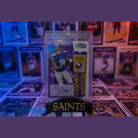 Football trading card with player image and 'Saints' branding on a background of other cards.