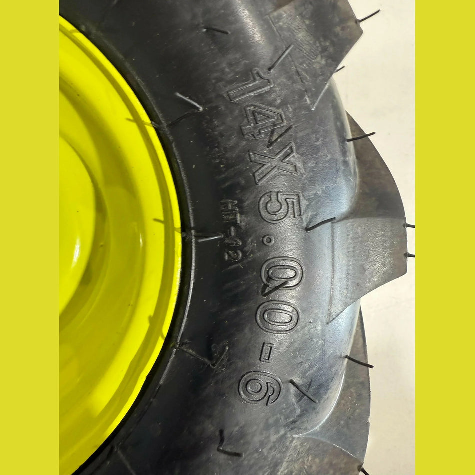 OEM Ryobi RY40702VNM Left Side Ryobi 14 x 5.00-6 Rim in Tire USED.