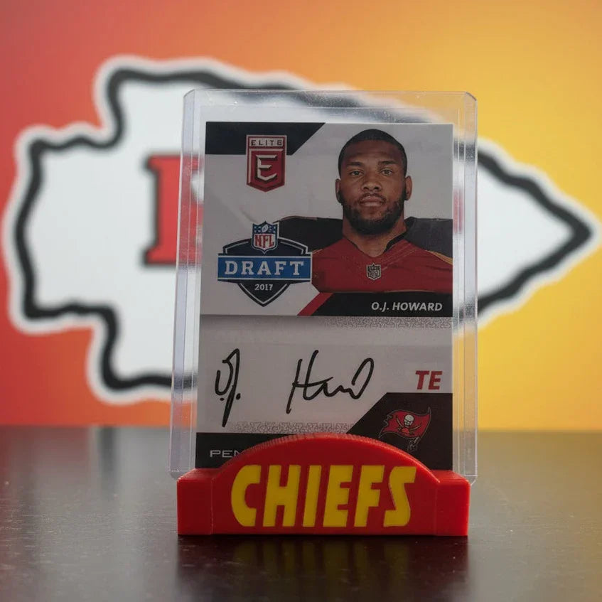 Football trading card of O.J. Howard with Chiefs branding on a reflective surface