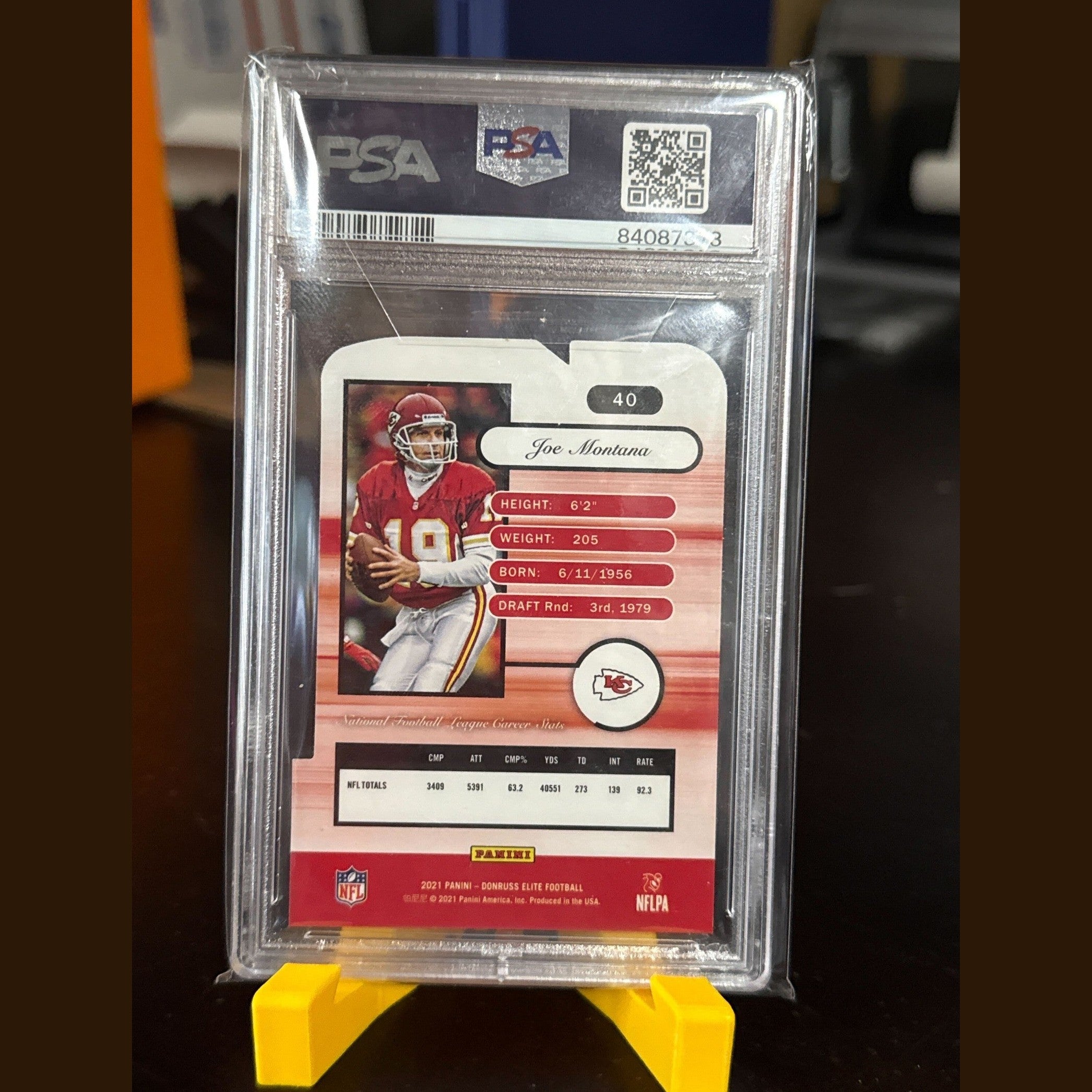 Football trading card in protective packaging with PSA grading logo