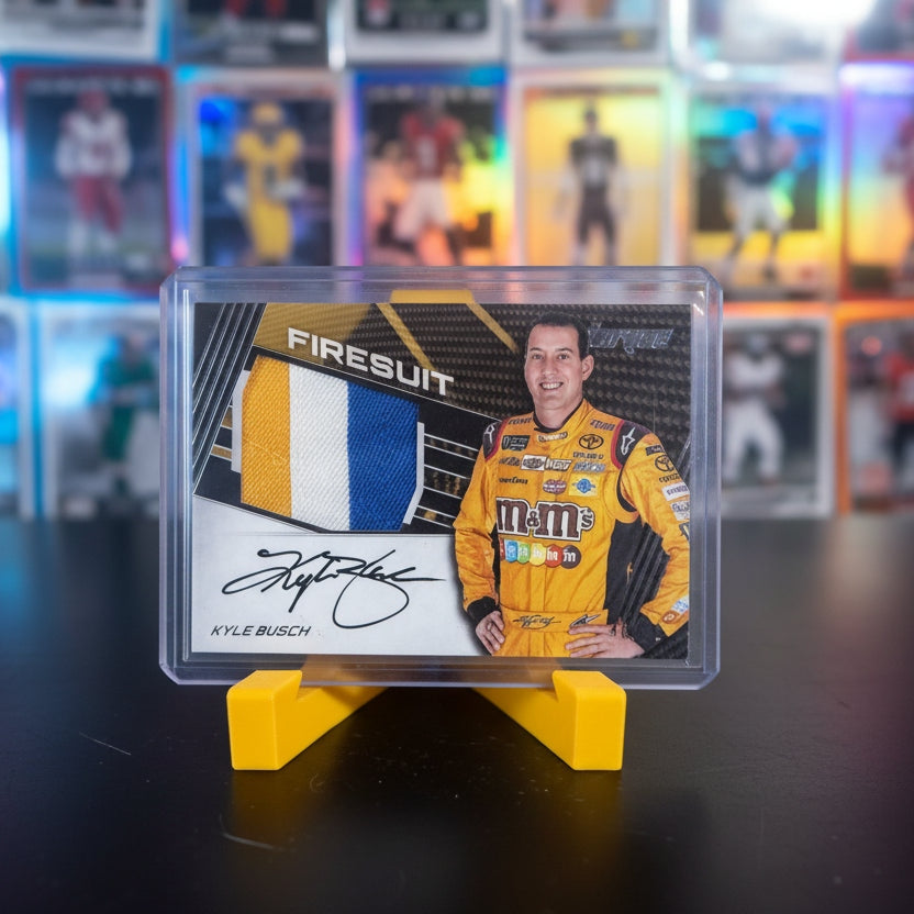 Card with a racing suit and driver's photo on a stand