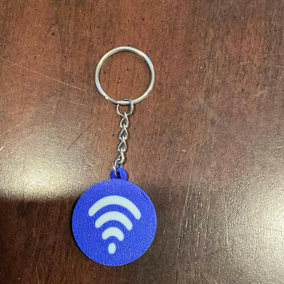3D printed Facebook scannable keychain (NFC tag).