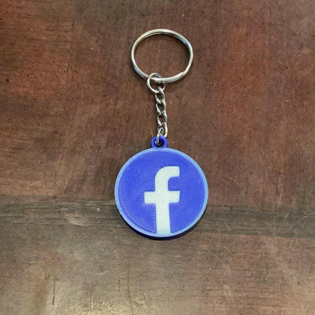 3D printed Facebook scannable keychain (NFC tag).
