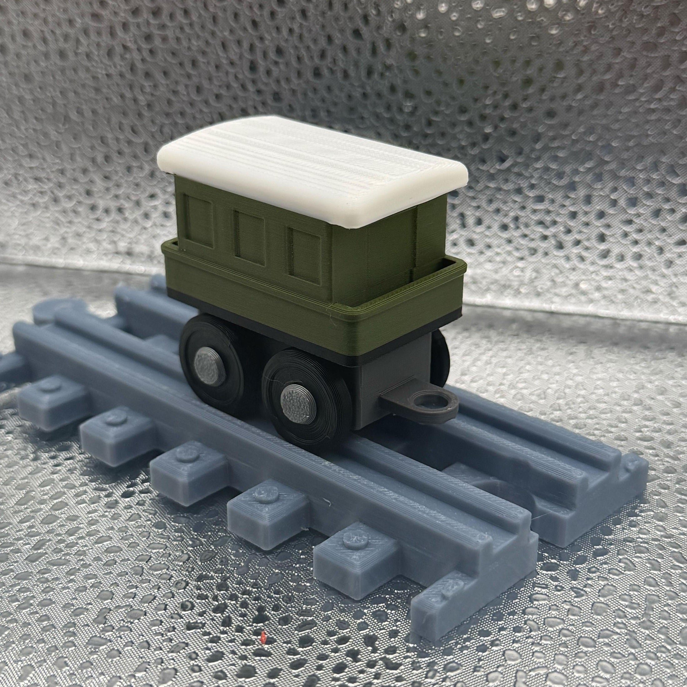 3D Printed Tiny Train Track Passenger Car.