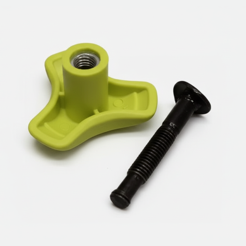 Green plastic component with a black screw on a white background