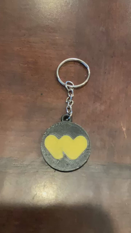 3D printed Whatnot scannable keychain (NFC tag).