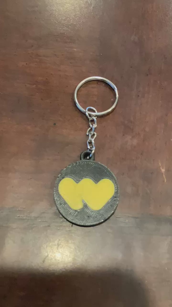 3D printed Whatnot scannable keychain (NFC tag).