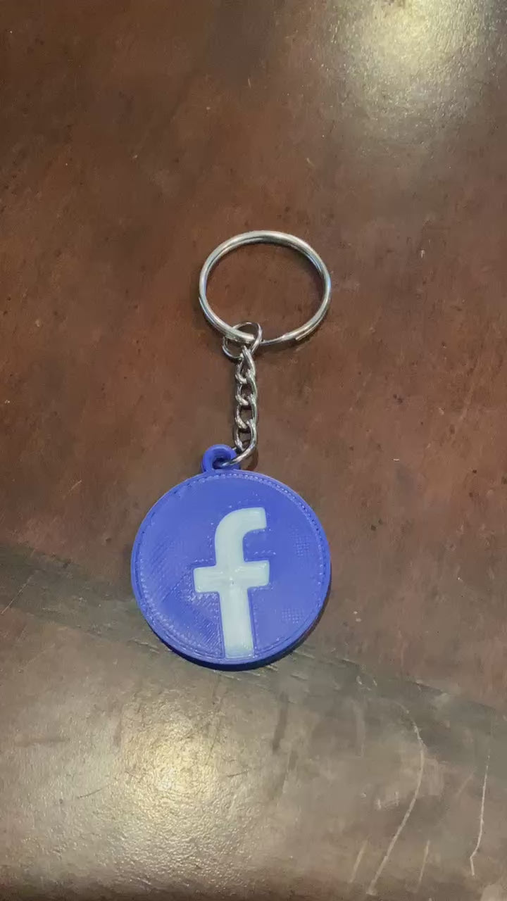3D printed Facebook scannable keychain (NFC tag).