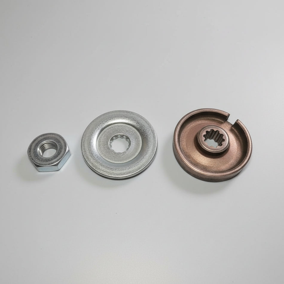 Three metal washers of different sizes on a textured gray surface