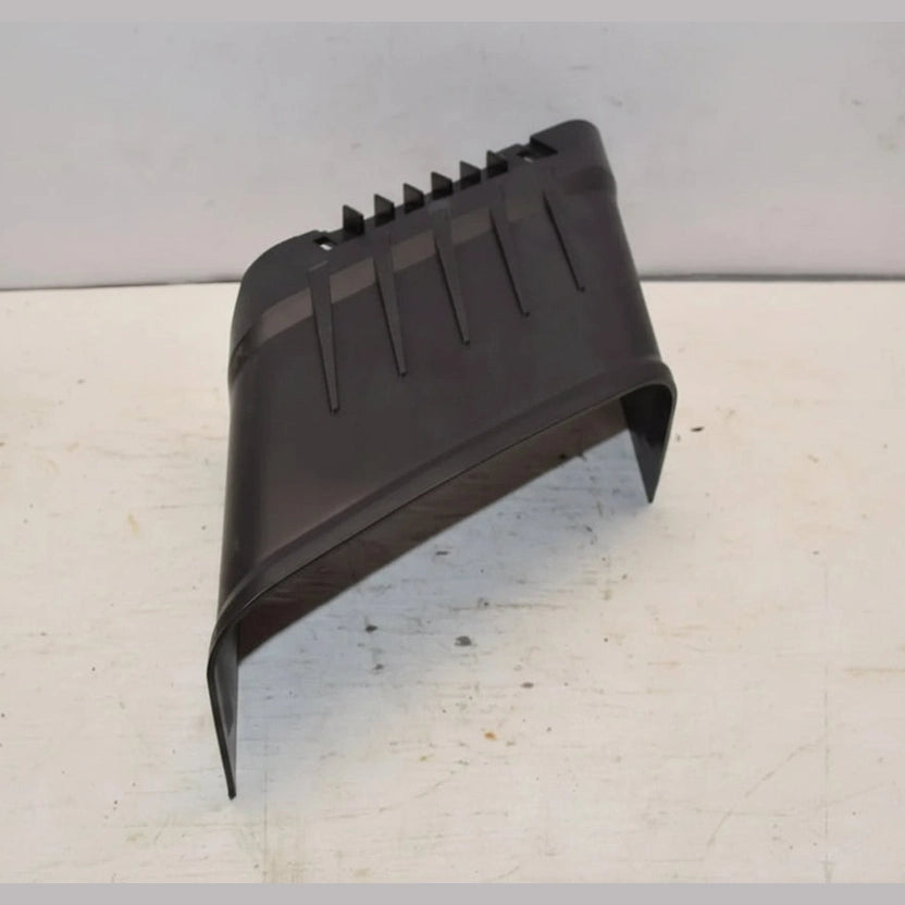 Black plastic scoop on a light gray background