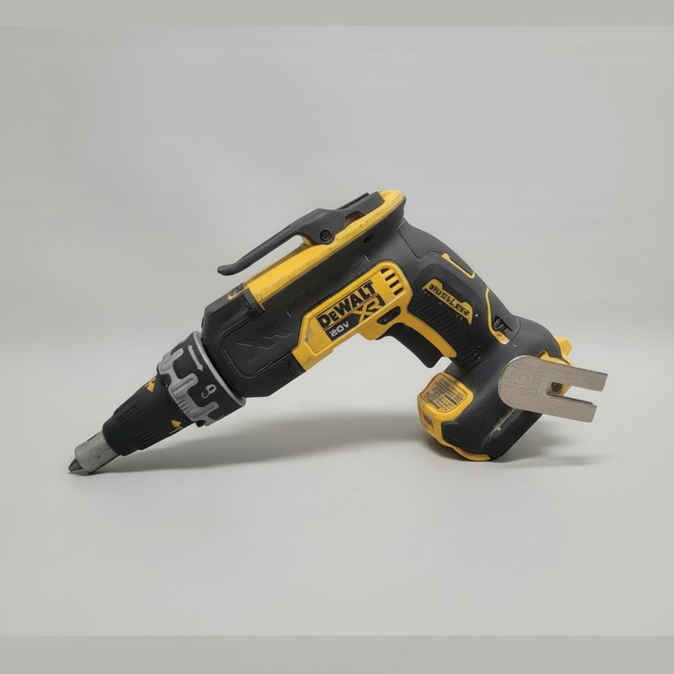 DeWalt oscillating tool on a gray surface