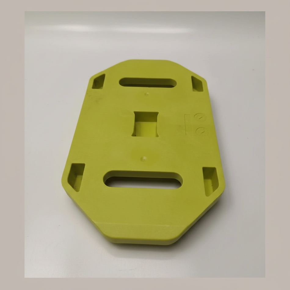 Yellow plastic bracket on a white background