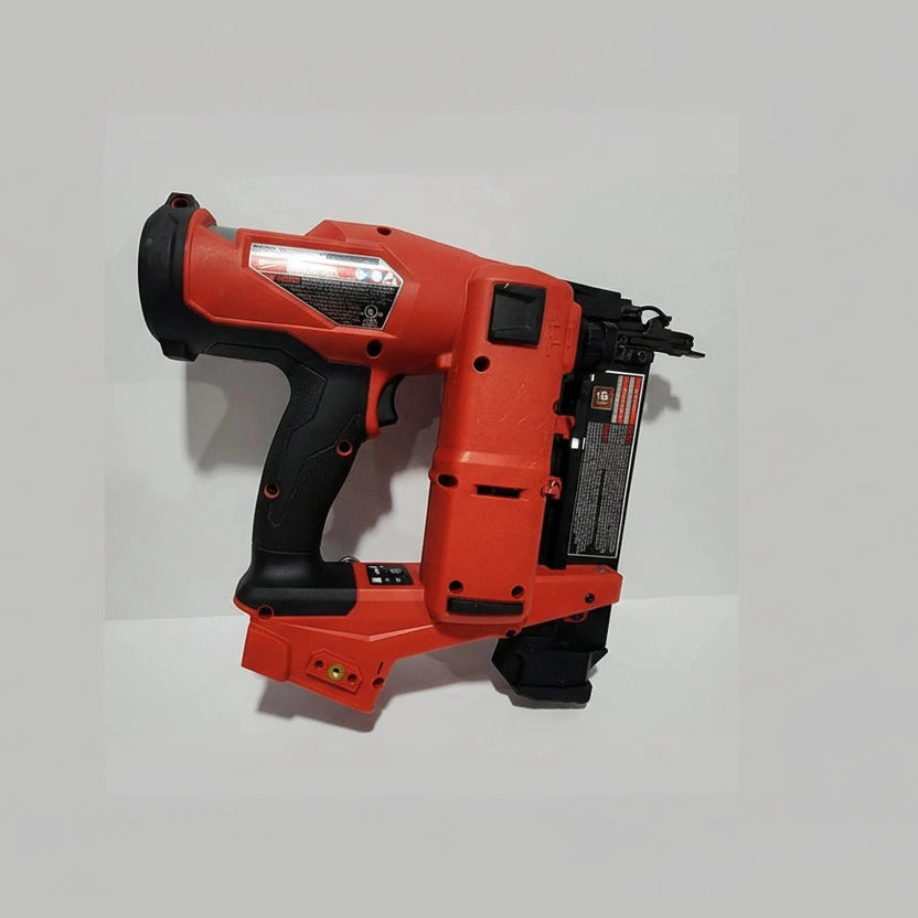 Red and black nail gun on a white background