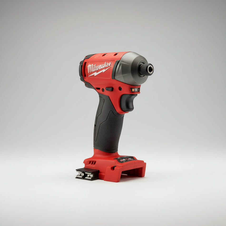 Red and black Milwaukee power drill on a gray background