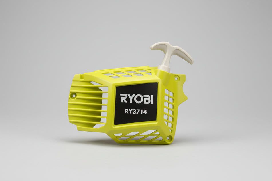 Yellow Ryobi tool on a beige background