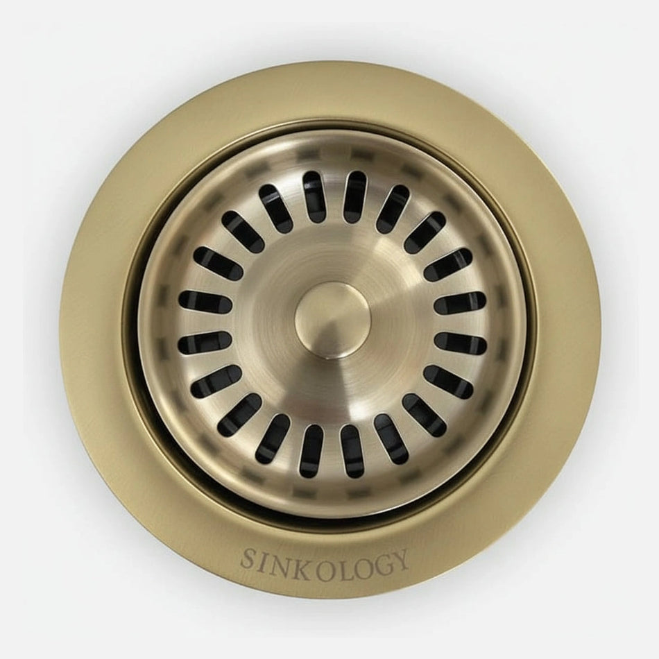 Brass sink drain with SINKOLOGY branding on a white background