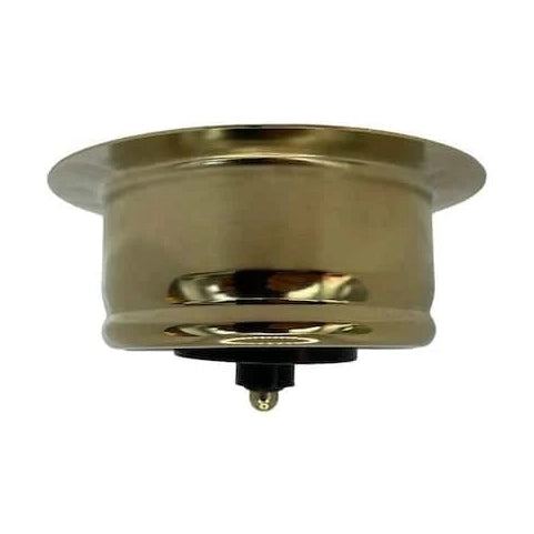 Gold-colored metal component on a white background