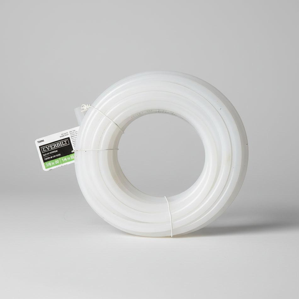 White spool of thread with a visible brand label on a woven surface