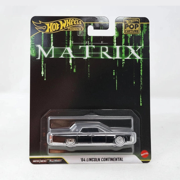 Hot Wheels '84 Lincoln Continental toy car in Matrix-themed packaging on a white background