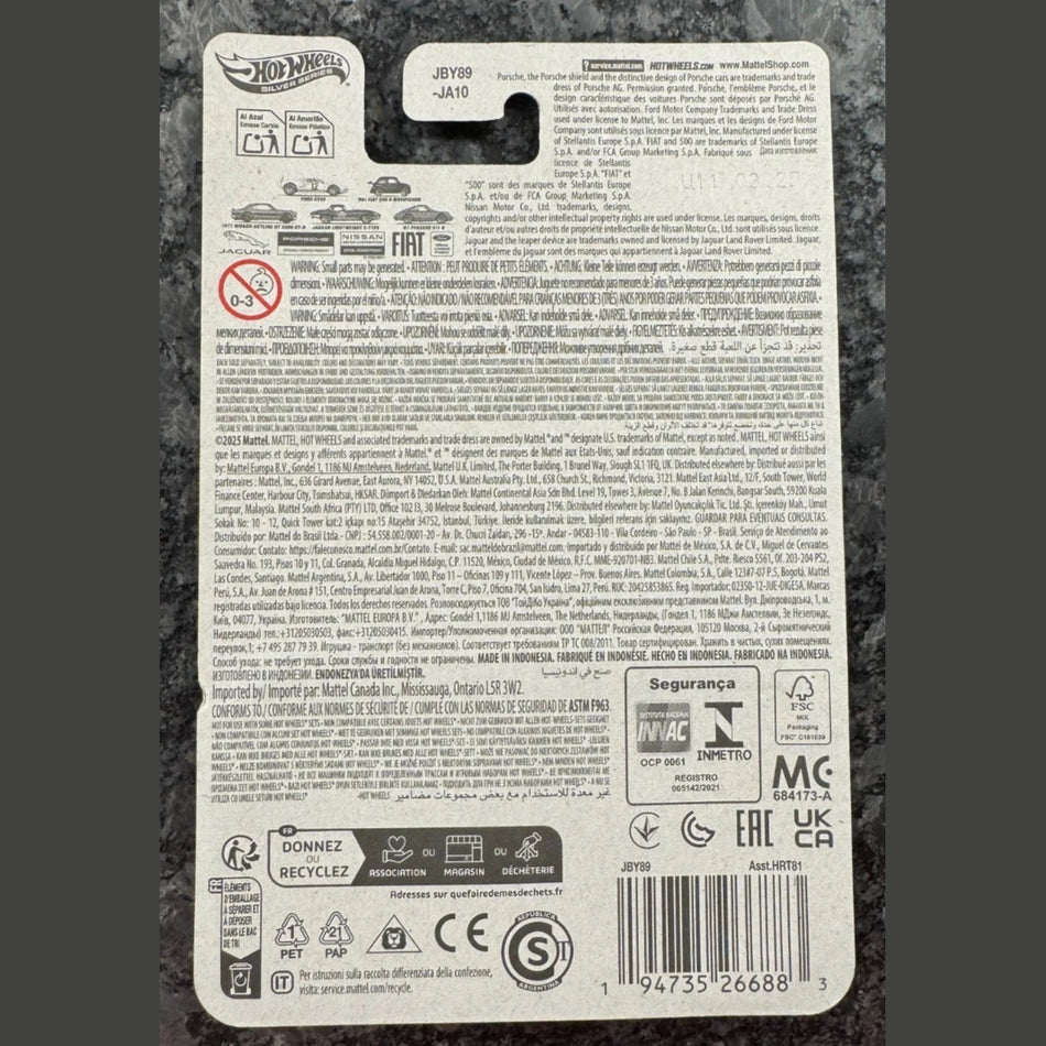 Back of a Hot Wheels toy car packaging with various labels and logos.