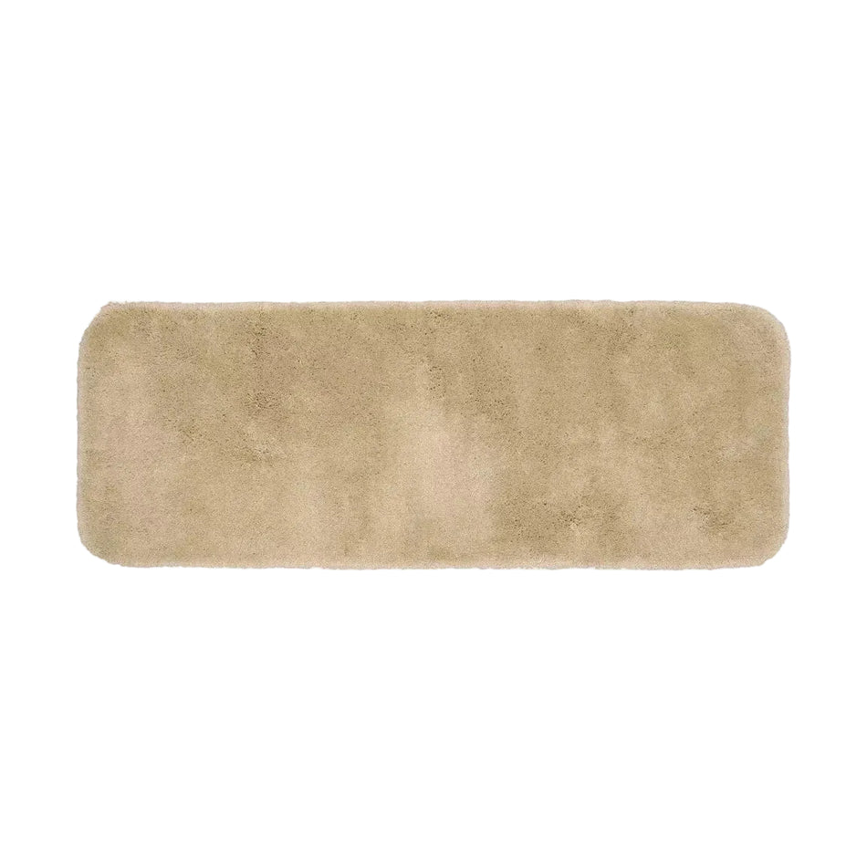 Beige bath mat on a white background