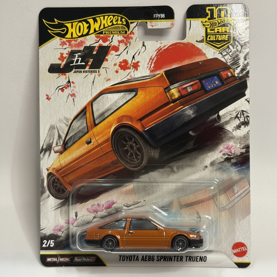 Hot Wheels Toyota AE86 Sprinter Trueno toy car in packaging with Japanese design elements.