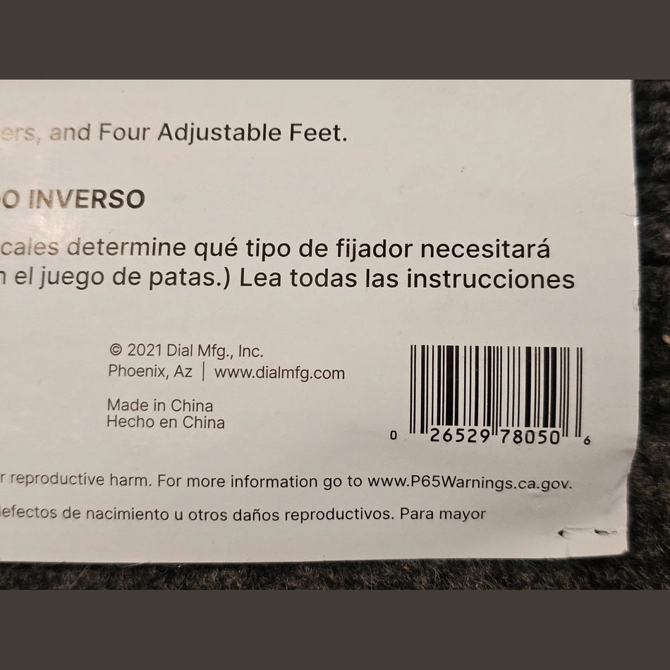 Product label with text and barcode on a textured surface