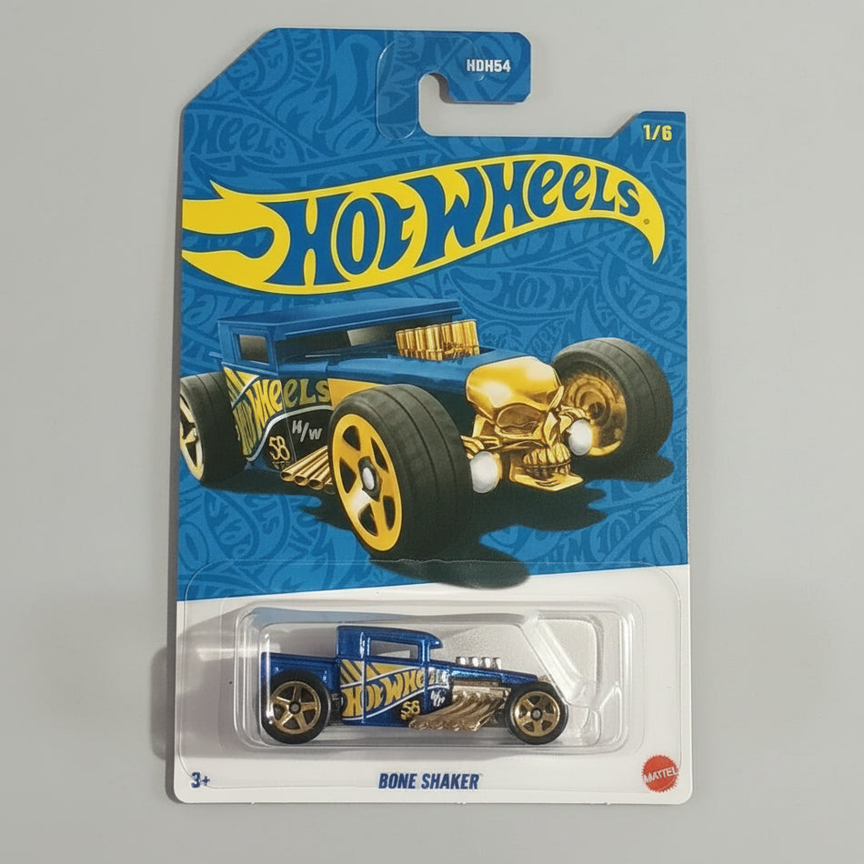 Hot Wheels toy car in packaging with blue and yellow design