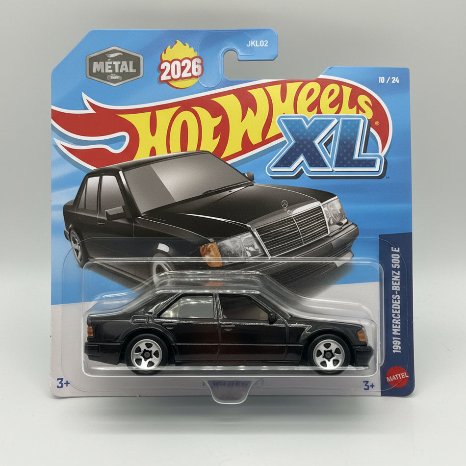 Hot Wheels XL toy car in packaging with Mercedes-Benz 600 SEL on a textured surface