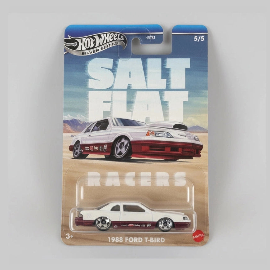 Hot Wheels 1988 Ford T-Bird toy car in packaging with 'Salt Flat Racers' theme.