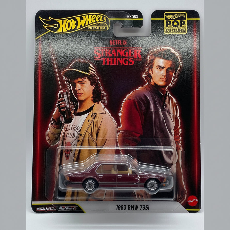 Hot Wheels Stranger Things action figure packaging with two characters and a car.