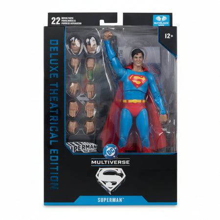Superman action figure in packaging with multiple face options on a white background