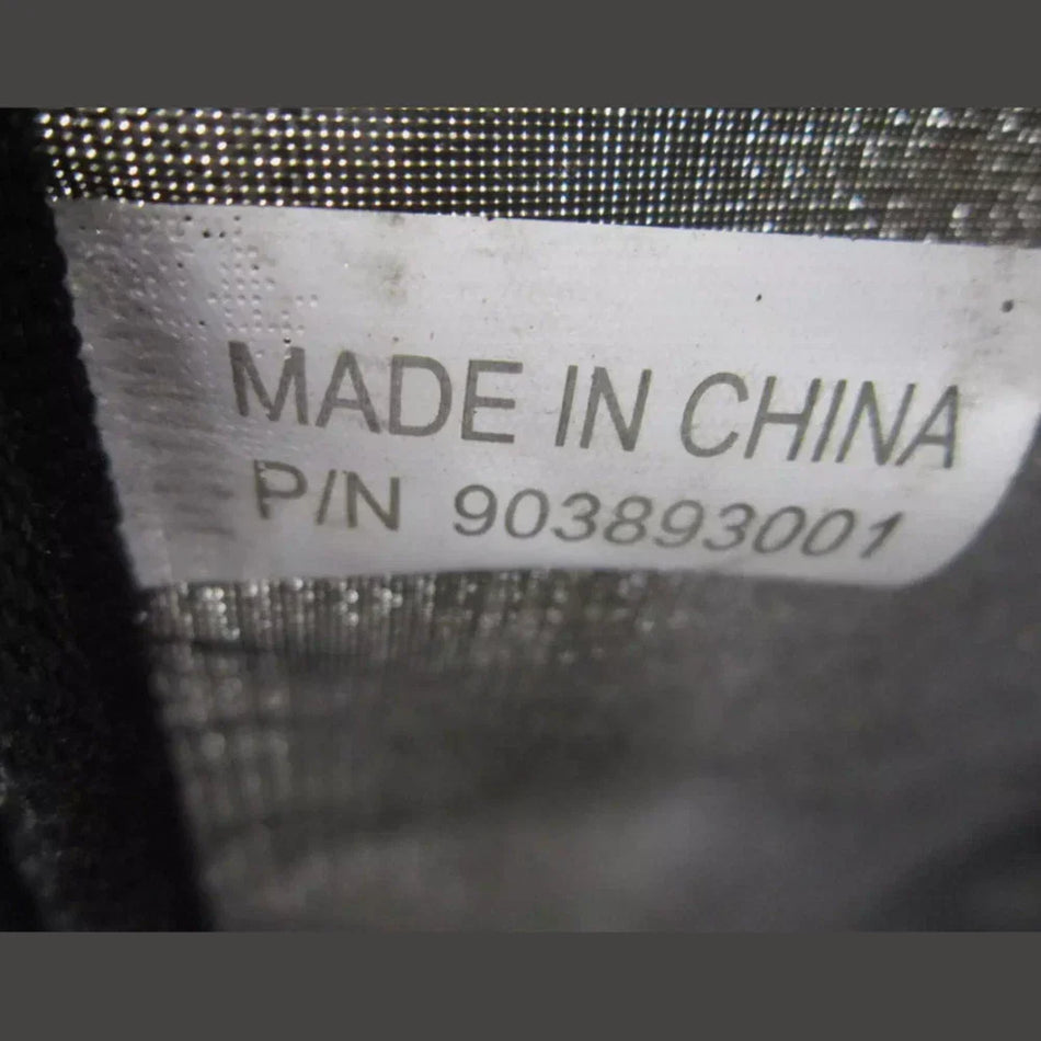Label with 'MADE IN CHINA' text on a textured surface