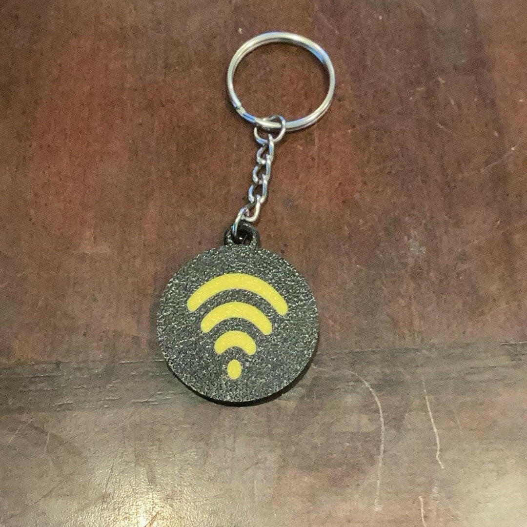 3D printed Whatnot scannable keychain (NFC tag).