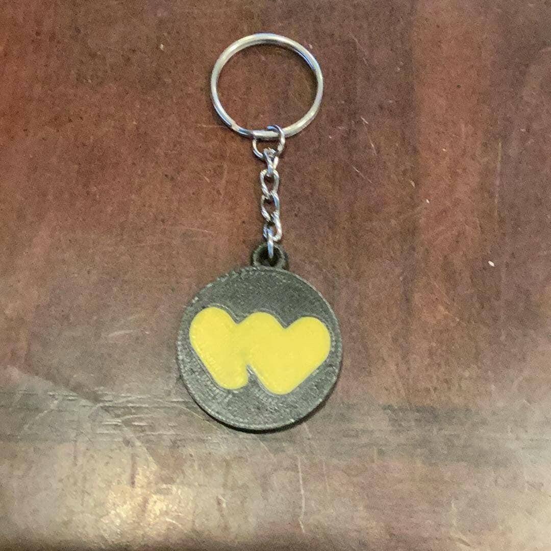 3D printed Whatnot scannable keychain (NFC tag).