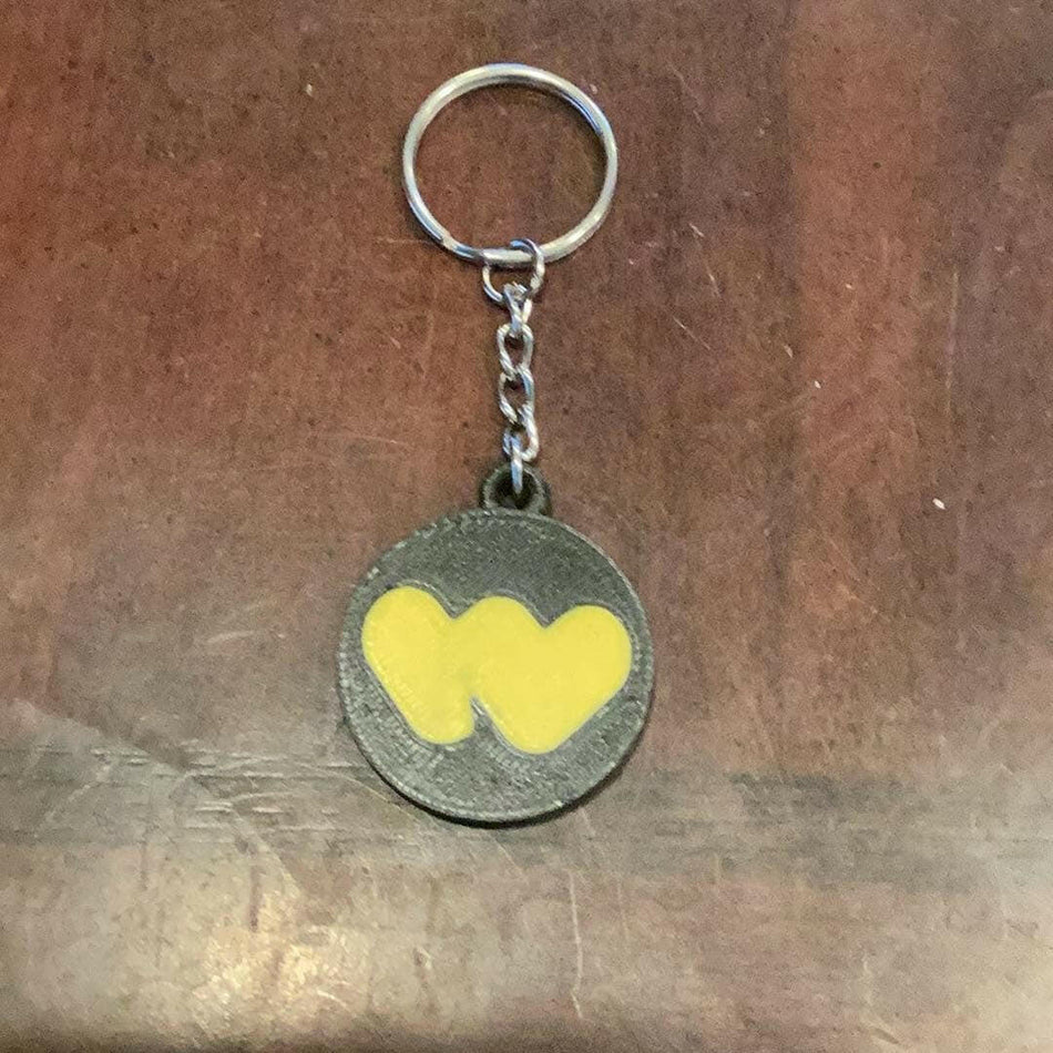 3D printed Whatnot scannable keychain (NFC tag).